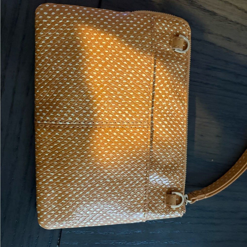This is a HAMMITT small Nash in Apricot Snake